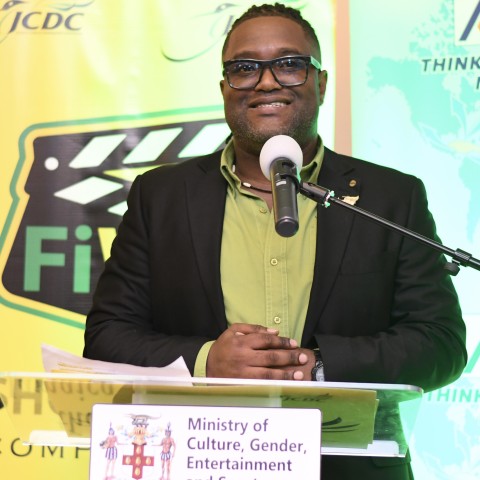 Acting Director of Arts Development and Training, and Drama Development Specialist at the JCDC, Mr. Shaun Drysdale speaking at the 4th staging of the JCDC FiWi Short Film award ceremony held at the Roof Terrace of the Ministry of Culture, Gender, Entertainment and Sport