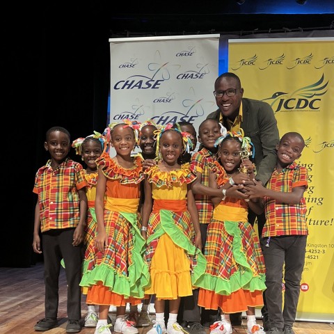 Young performers from White Hall Primary School in St. Thomas proudly accept one of their many trophies at the National Finals of the Festival of the Performing Arts, organized by the Jamaica Cultural Development Commission (JCDC) and held at the Little Theatre on April 14, 2026. Presenting the award is Dr. Winston Campbell. The group secured top awards for Quadrille Contra Style Class 1 and Quadrille Camp Style Class 2, and was also adjudged Best Overall Performers in Classes 1 and 2.